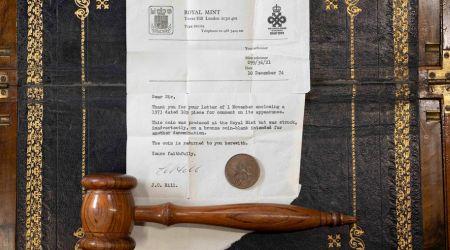 This coin was produced at the Royal Mint but was struck, inadvertently, on a bronze coin-blank intended for another denomination. This coin was produced at the Royal Mint but was struck, inadvertently, on a bronze coin-blank intended for another denomination.